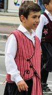 boy in traditional costume on holiday in cyprus