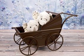 plush elephants in a stroller