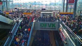 a crowd of people at the railway station in Berlin