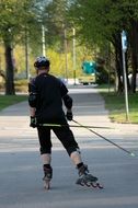 Inline Skating, man in helmet on pavement