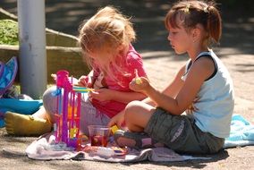 girls play outdoors