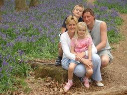 family photo at the field of flowers