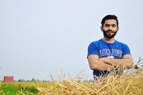 young farmer among the field