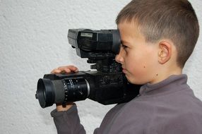 Young boy with camera