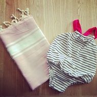 towel and children's swimsuit for the pool