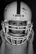 Boy in the Football Helmet