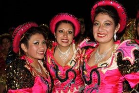 women in colorful costumes at the festival