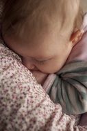 Baby Sleep in mom's arms
