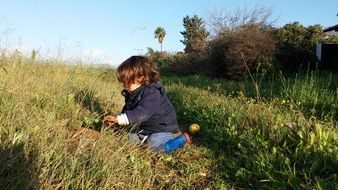 Child Playing on the Field