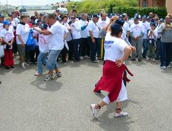 people are dancing in the street in Rome, Italy