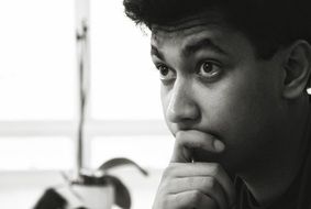 black and white portrait of a curious man