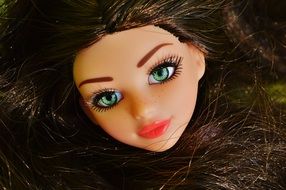 doll as a beauty with green eyes