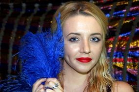 blonde with blue christmas tinsel
