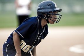 softball player in helmet in profile