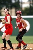 two girls in softball