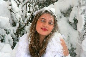 blonde posing among the snow