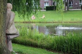 Sculpture by lake