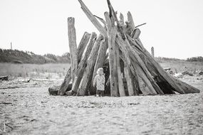 black and white photo of a child near the fort
