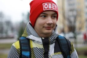 child Boy in red hat outdoor, portrait