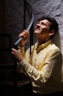 Man posing under light