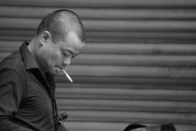 smoking man in profile