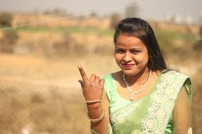 beautiful indian woman in green sari