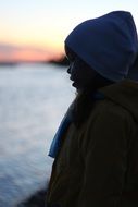 girl profile silhouette by the river