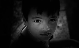 Black and white portrait of the boy