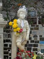 child boy, marble gravestone with crown on head