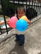 Boy with balloons in the hands