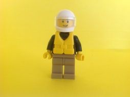 male worker in safety Helmet, lego toy