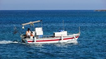 fishing boat on the water on a sunny day