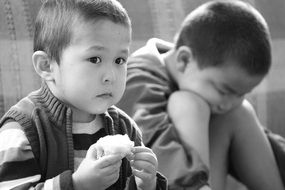 black and white image of two children