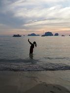 girl making selfie on the beach