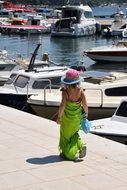girl in green on Sea Boats