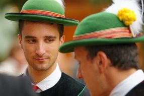 People with green hats