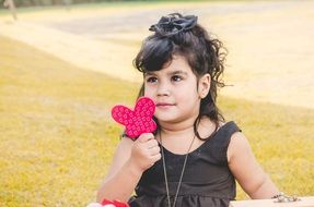 little girl in a black dress