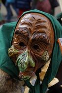 man with a wooden mask at the swabian alemannic festival