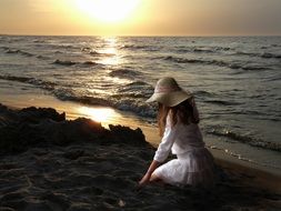Sunset on the beach in the evening in summer