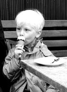 child eating ice cream monochrome photo