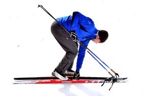 skier in a blue jacket on the snow