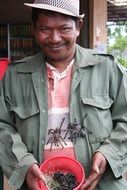 giant Spiders Crawling on torso of smiling man