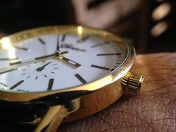 gold watch as a decoration on the hand