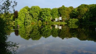 lake among green idyllic landscape