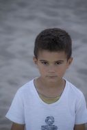 Child boy in white t-shirt