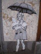 Graffiti of the girl with the umbrella