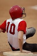 softball player in a red helmet
