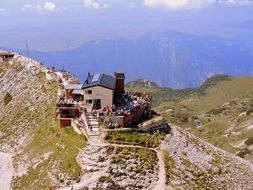 landscape of hikers in the mountains in trentino