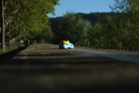 children's sandal lies on the road