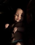 Baby portrait in contrast light